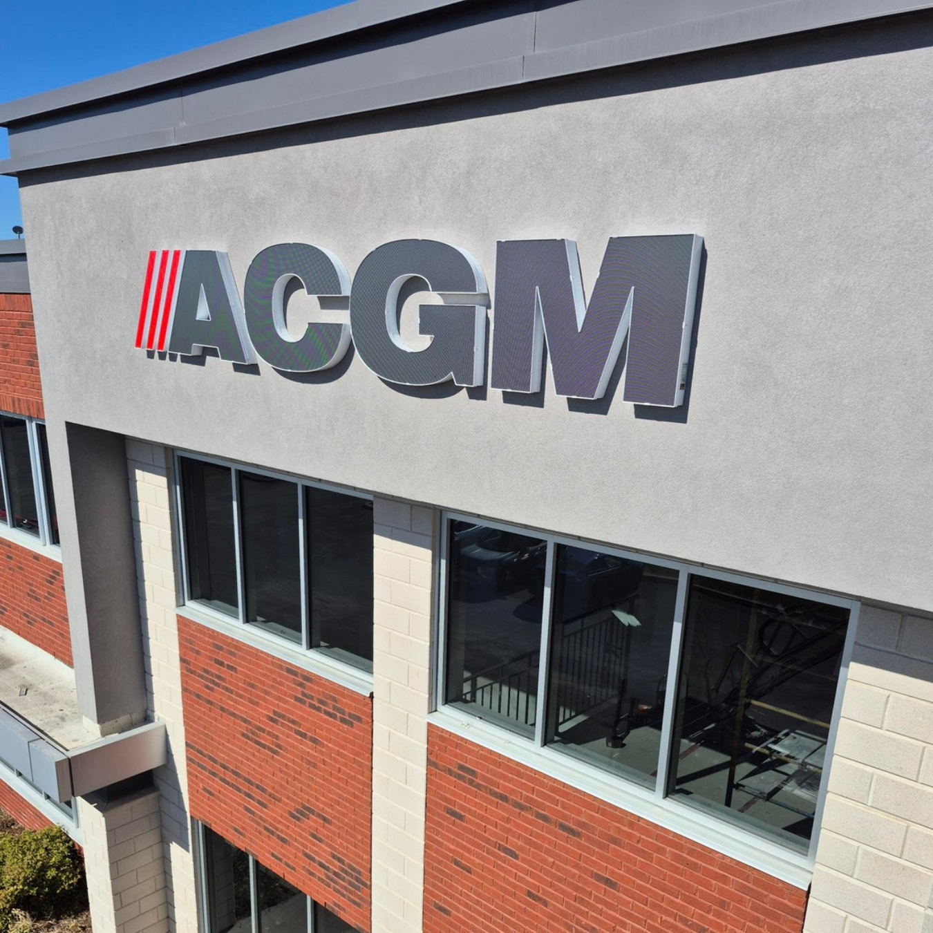 Building sign in channel letters for ACGM