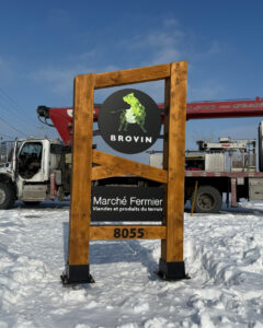 Pylon-mounted sign for Brovin farm in Saint-Hyacinthe